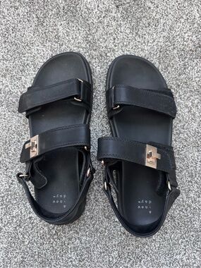Black Strappy Sandals with Gold Buckles